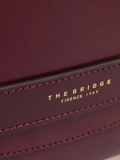 LUCREZIA Pochette con polsierina in pelle grape abb. oro - Borse Donna