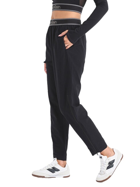 CK PERFORMANCE Pantaloni di tuta con zip sul fondo black beauty - Tute sportive Donna