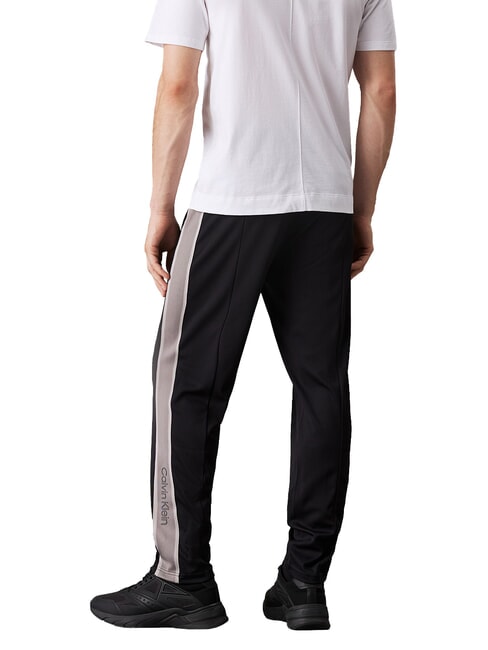 CK PERFORMANCE Pantaloni di tuta con logo laterale black beauty - Tute sportive Uomo